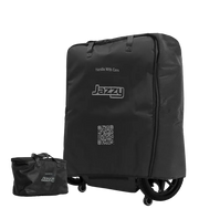 Large black Jazzy travel bag covering a power chair beside a smaller black Jazzy battery bag